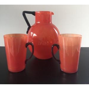 Charles Schneider A Set Of French Glassware Consisting Of A Pitcher And Two Glasses
