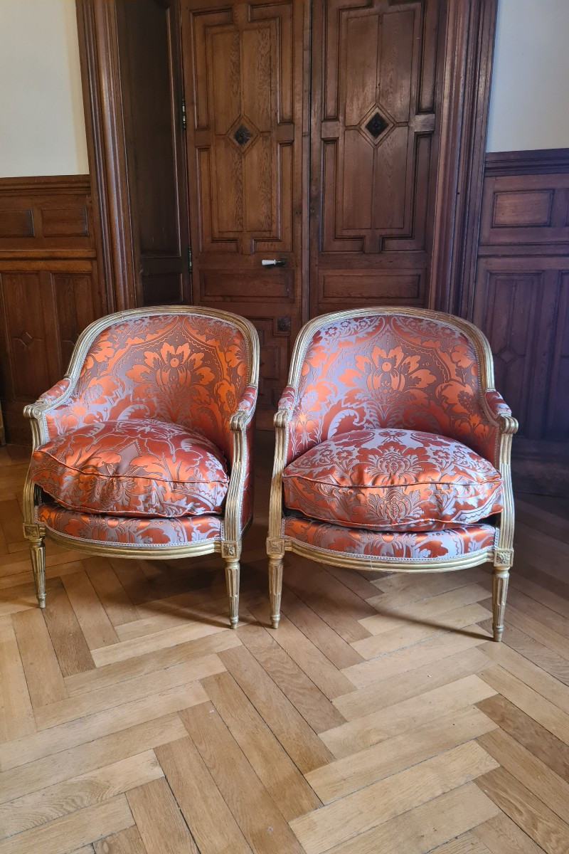 Paire de bergères gondoles en bois doré époque Louis XVI