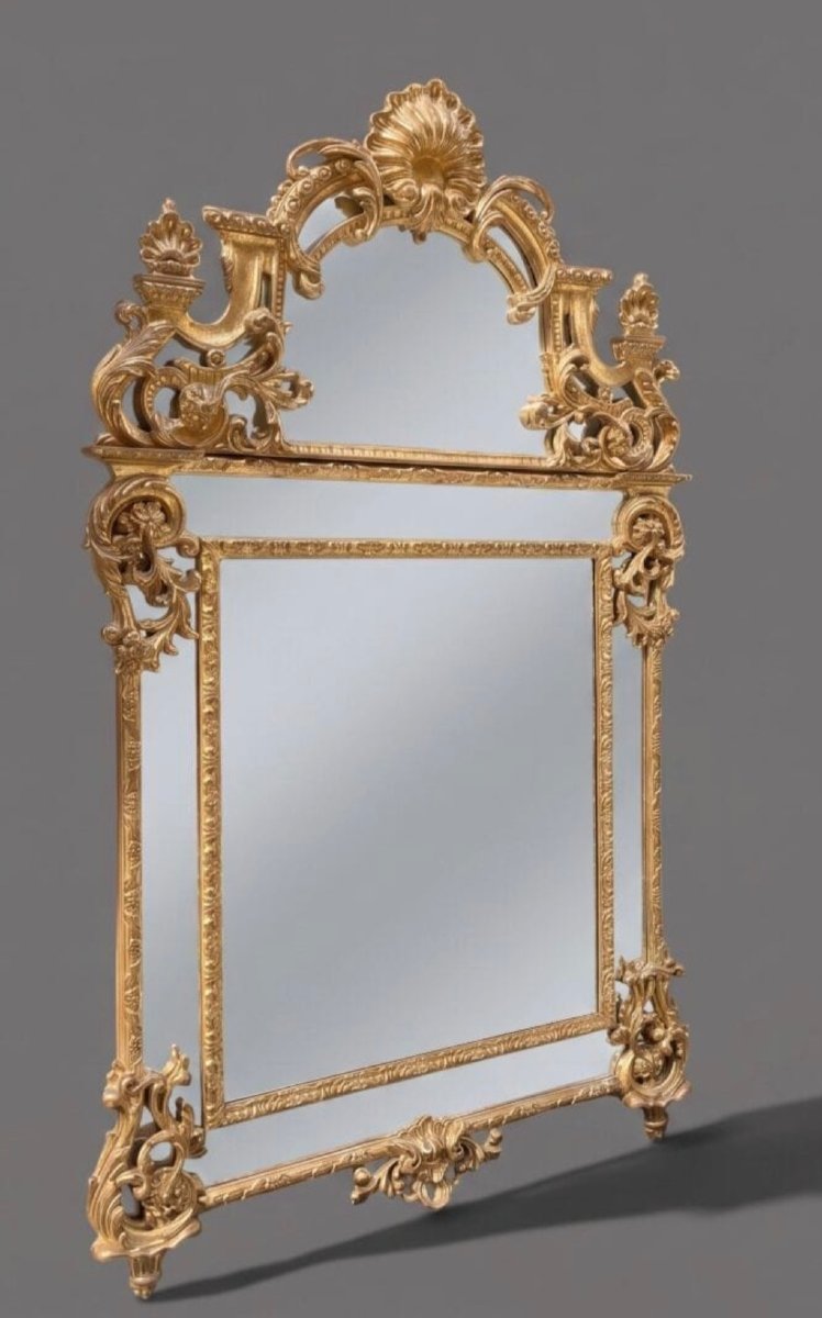 Miroir style régence en bois doré , 1ere moitié du XIXème 