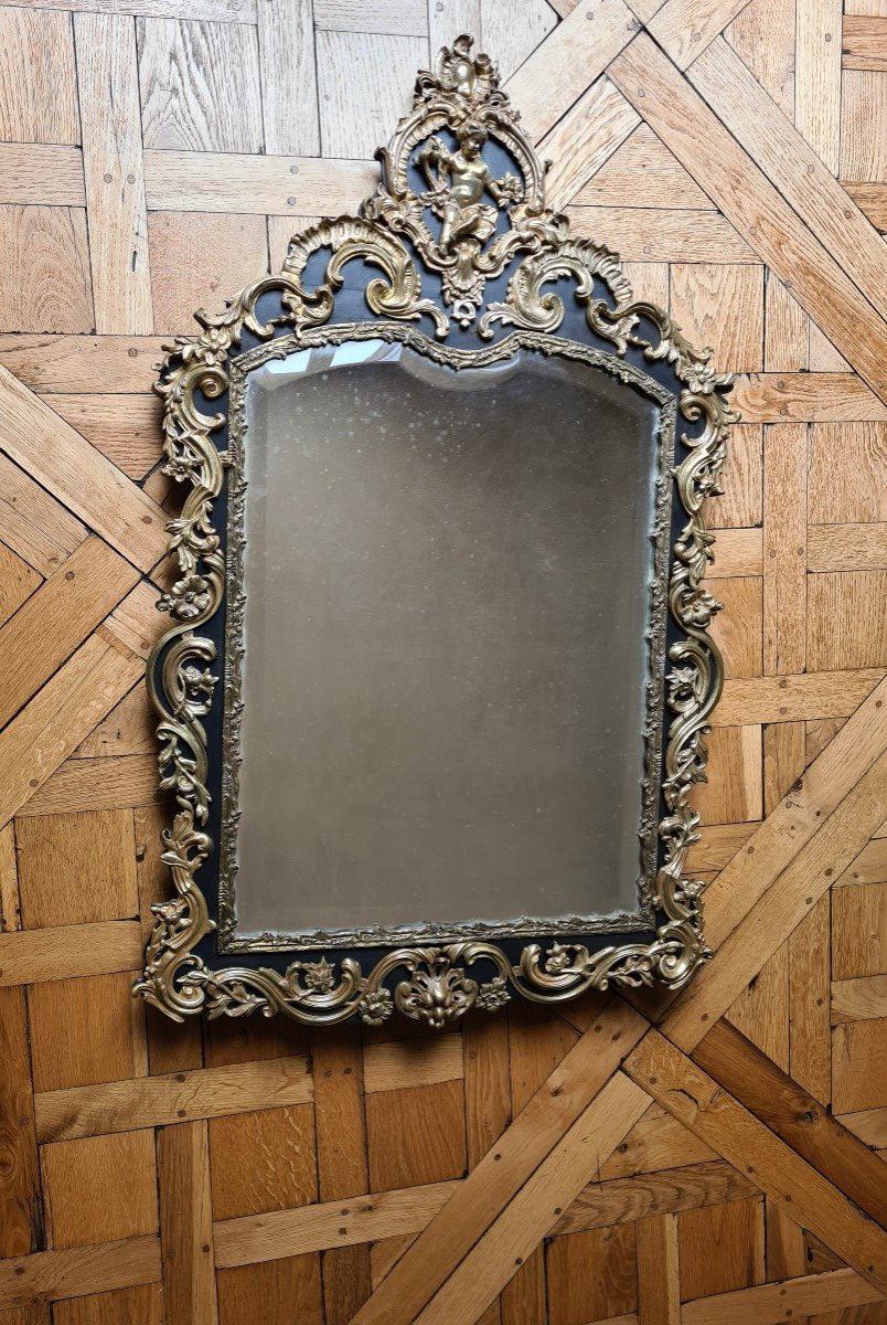 Miroir Napoléon III , à riche décor de  bronze doré 