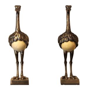Paire d'autruches en métal argenté avec leurs oeufs, circa 1980