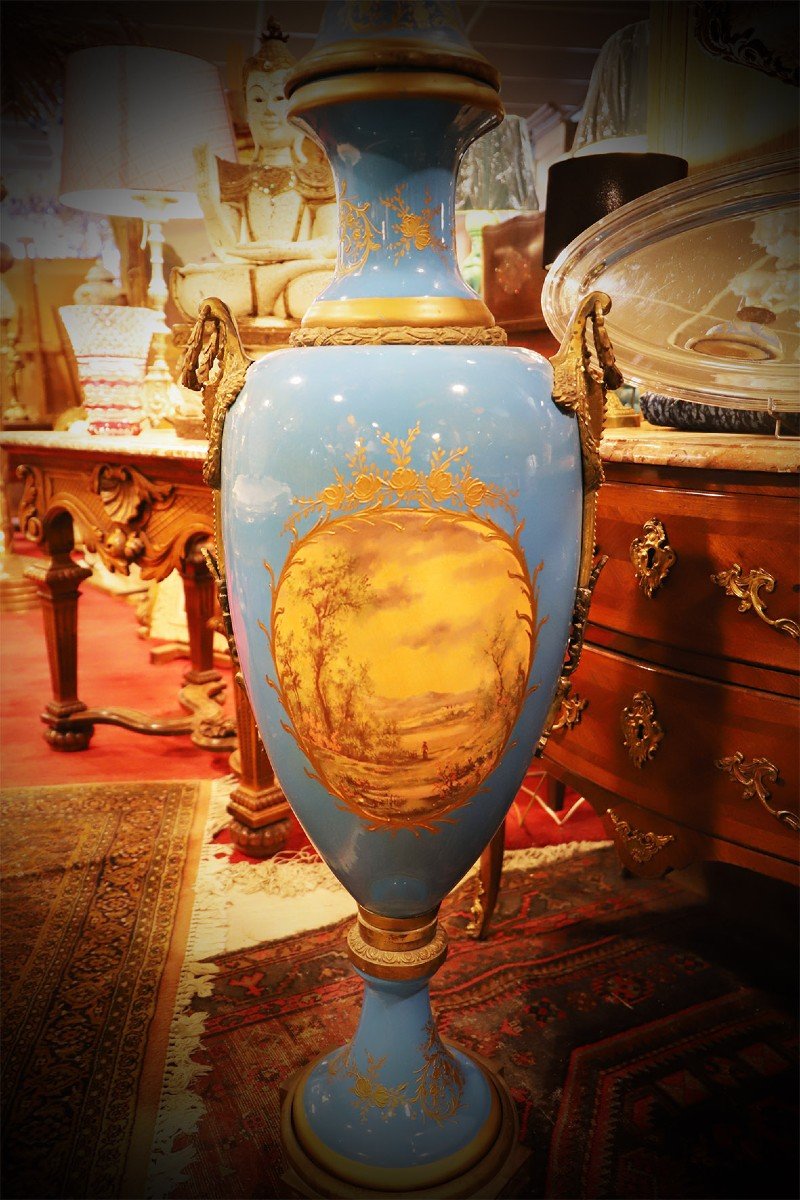 Pair Of Porcelain And Bronze Vases