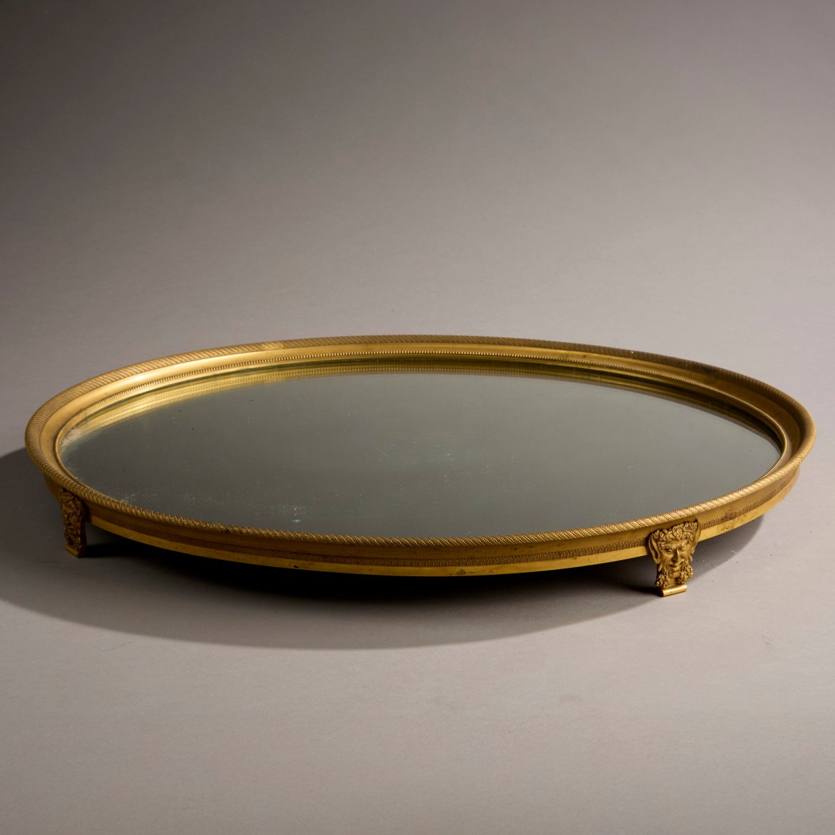 Surtout de table en bronze ciselé et doré aux têtes de faunes Epoque Empire 