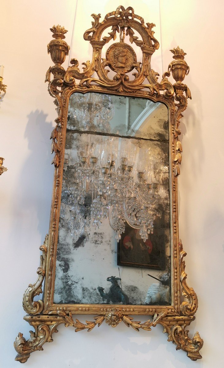18th Century Italian Mirror In Golden Wood.