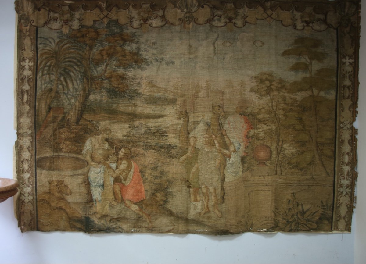 Grande toile peinte du XVIIIe, " halte d'une caravane à un puits"