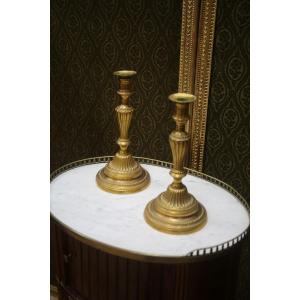 Pair Of Gilt Bronze Candlesticks From The Louis XVI Period.