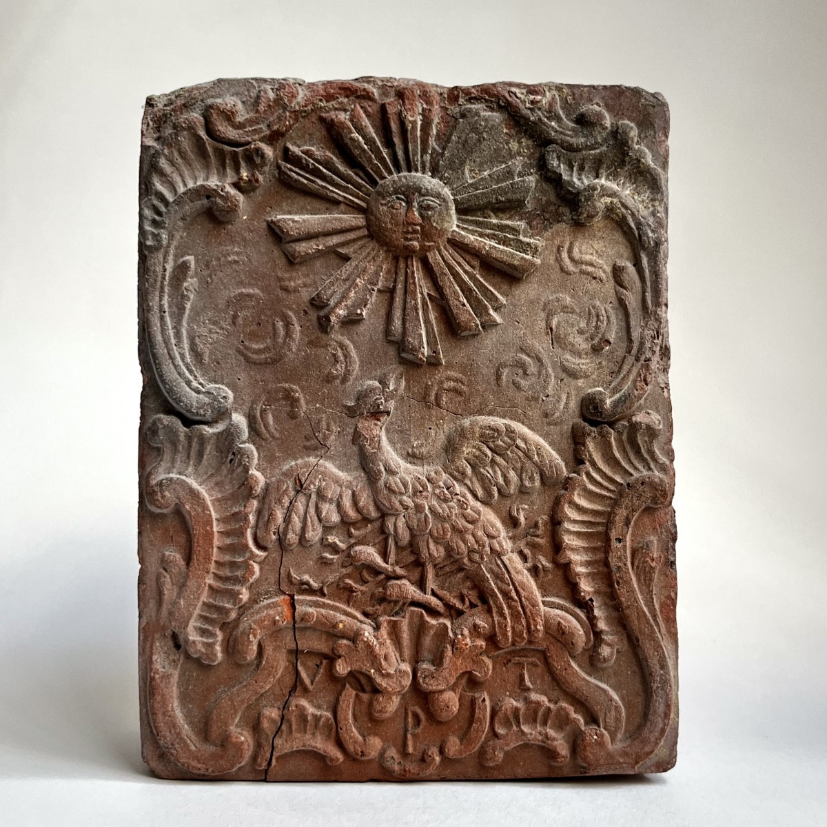 18th-century Terracotta Fireplace Brick Decorated With A Sun And Phoenix Motif - An 18th-century Curiosity 