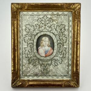Canivet XVIIIe à décor de gouache miniature enfant Jésus dans un cadre en bois doré 18e siècle