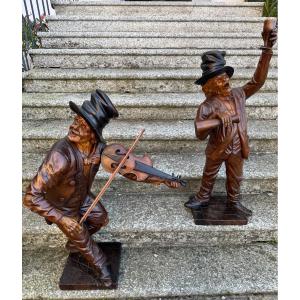 Importante paire de sculptures en bois « musiciens de taverne », travail italien fin XIX ème.