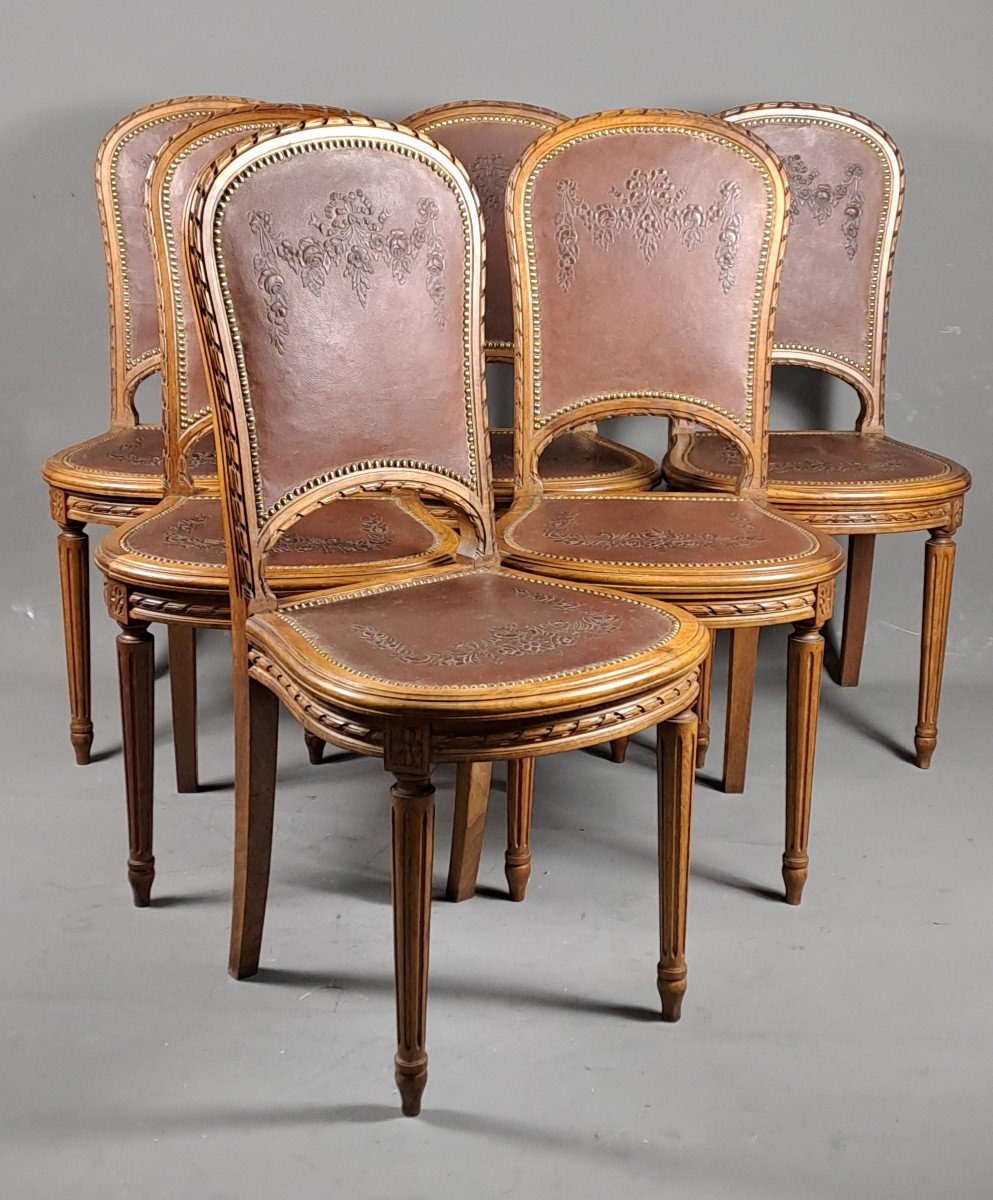 Series Of 6 Louis XVI Style Chairs In Solid Walnut And Embossed Cordoba Leather Trim