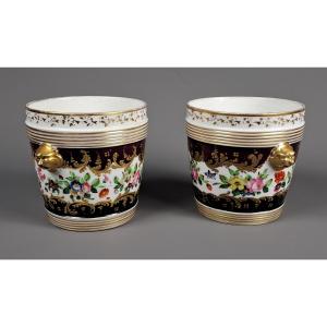 Paire de cache-pots en porcelaine de Paris