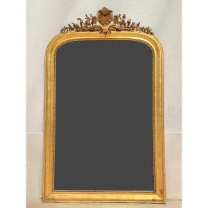 Grand miroir Louis Philippe en bois et stuc doré