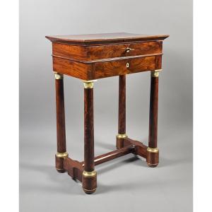 Table travailleuse à écritoire d'époque Empire en ronce d'acajou de cuba