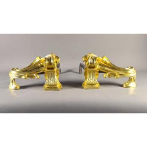 Paire de grands chenets de style transition en bronze doré