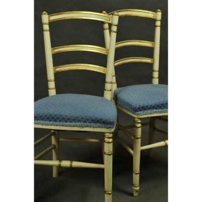Pair Of Directoire Style Chairs In Gilded And Lacquered Wood