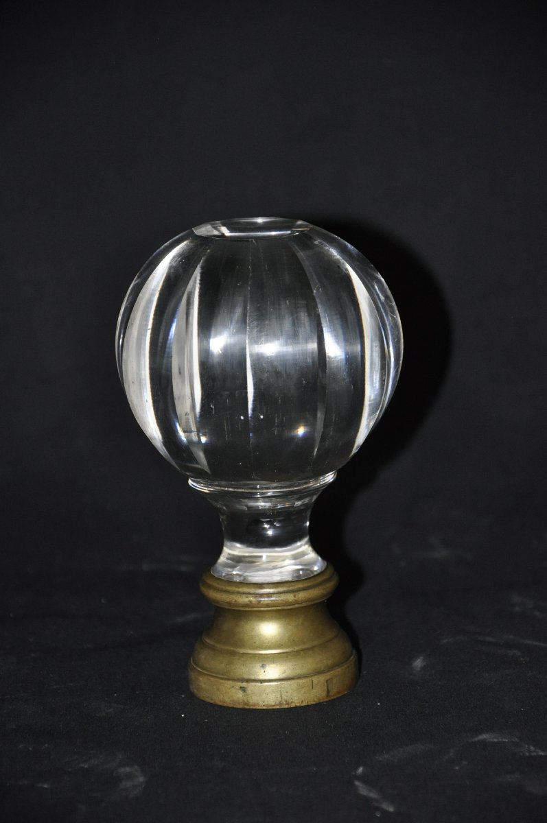 Crystal Ball At The End Of A Staircase Railing 