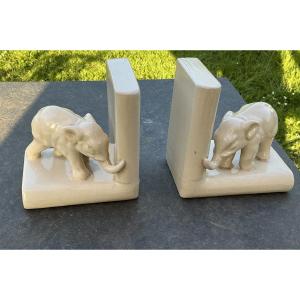 Paire de presse-livres avec éléphanteaux en céramique craquelée blanc ,Art déco.