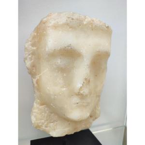    A South Arabian Alabaster Relief Head Of A Man  Qataban,  1st Century A.d.