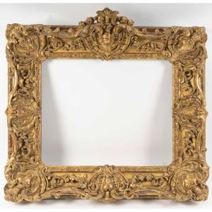 Cadre en bois doré sculpté d'époque Louis XV