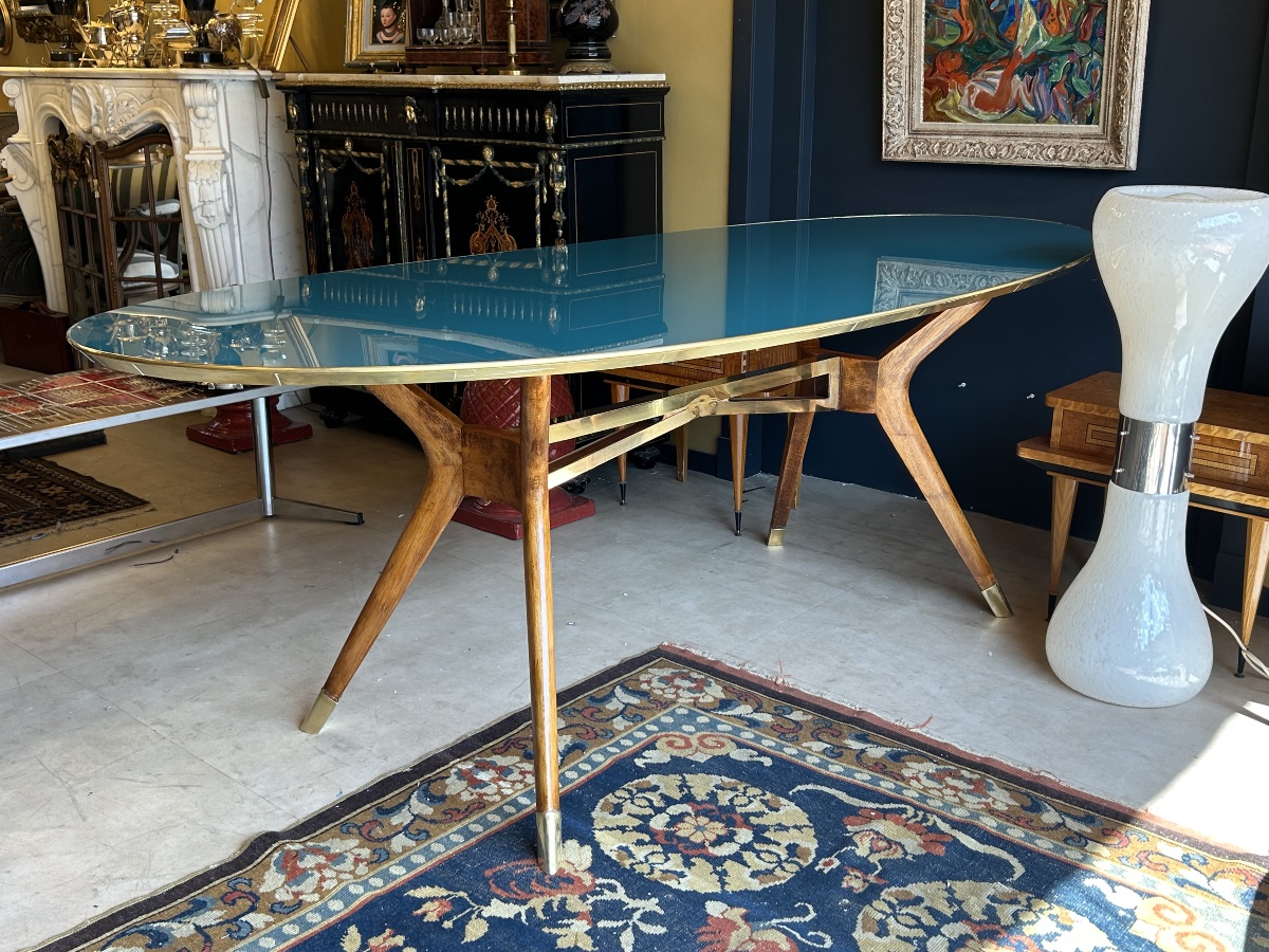 Oval Table With A Blue Lacquered Glass Top, Wooden And Brass Base — Italy, 1960s