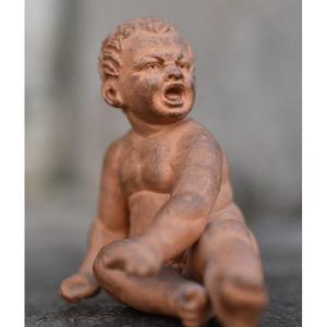 Paire d'enfants en terre cuite (vers 1870)