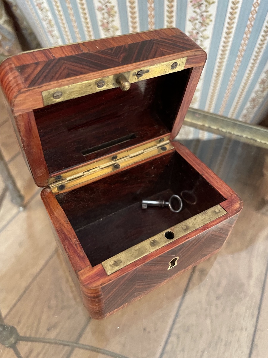 A Tiny Piggy Bank With Its Key-photo-3