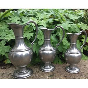 The Suite Of 3 Pewter Pitchers