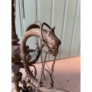 Lustre a 4 feux aux têtes d’aigle 