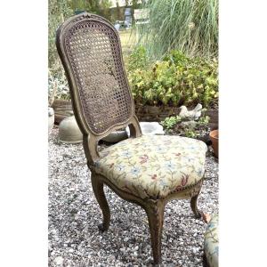 Repose pied recouvert de tapisserie au point