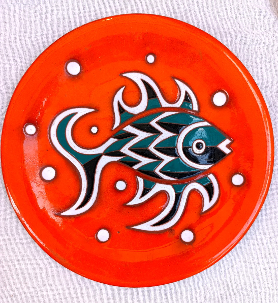 Jean Picart Le doux (1902-1982), Le poisson vert, Assiette en céramique émaillée, signée dos