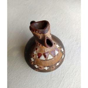 20th Century Mexican School, Small Terracotta Pitcher With Anthropomorphic Decor.