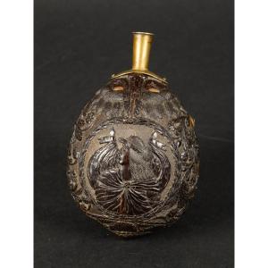 Poire à poudre avec profil d'homme, noix de coco, XVIIIe-XIXe siècle. 