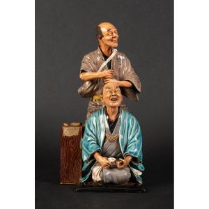 Le coiffeur et son client, Japon, ère Meiji, fin du XIXe siècle.  