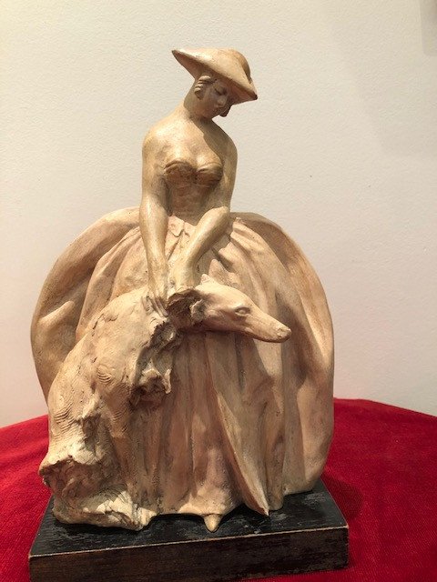 TERRE CUITE "JEUNE FEMME ET SON CHIEN" signée LOUIS ICART 