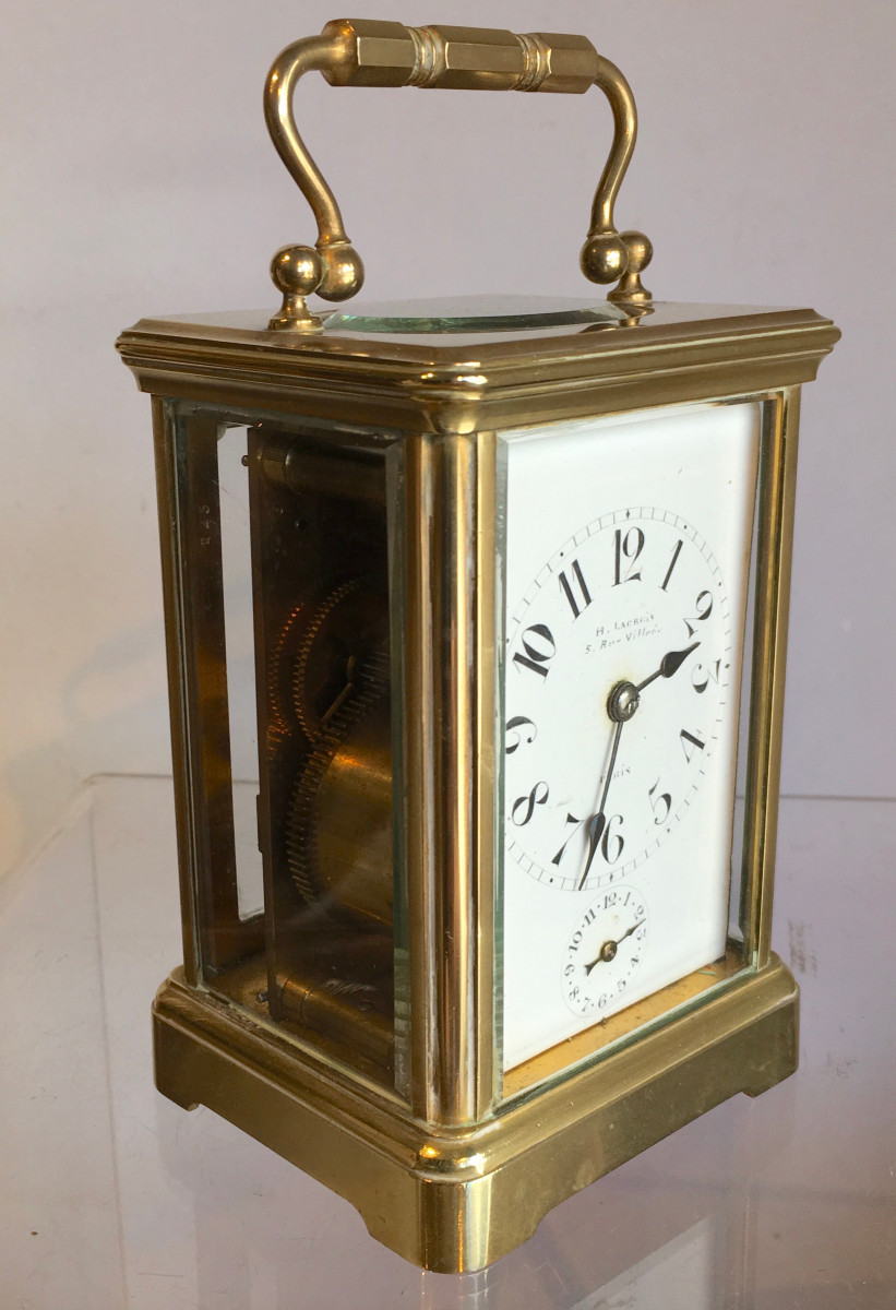 Pendule de voyage d'officier en laiton dans son coffret cuir. France XIXe siècle. 