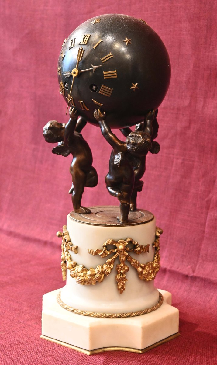 ​Pendule de style Louis XVI aux trois amours en bronze-photo-1