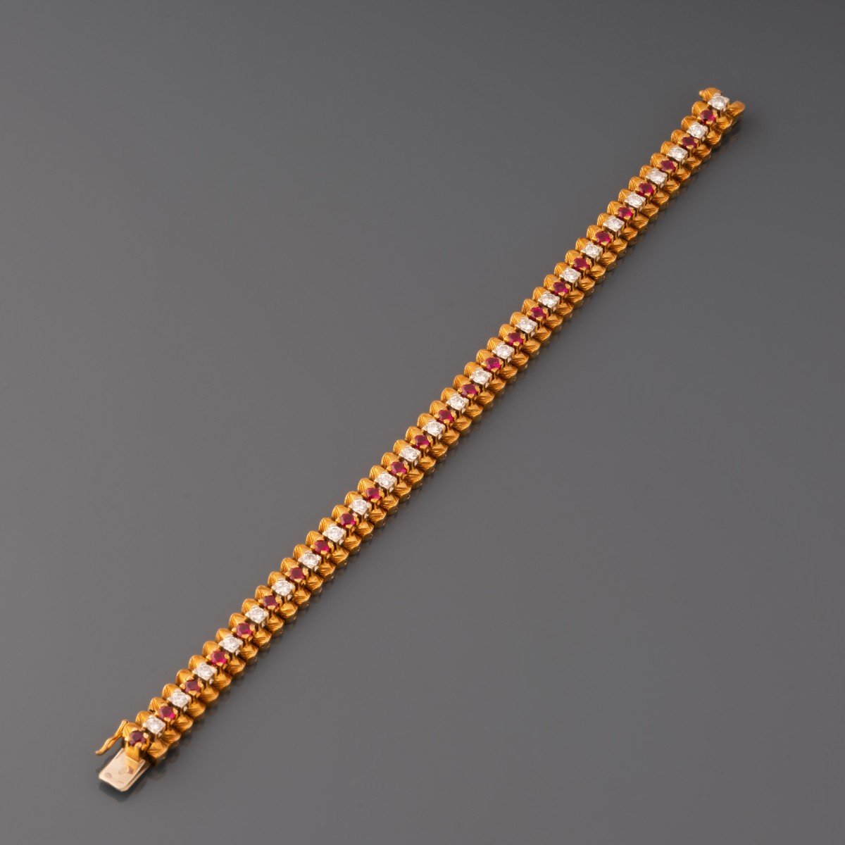 A Vintage French Gold Diamond And Ruby Bracelet