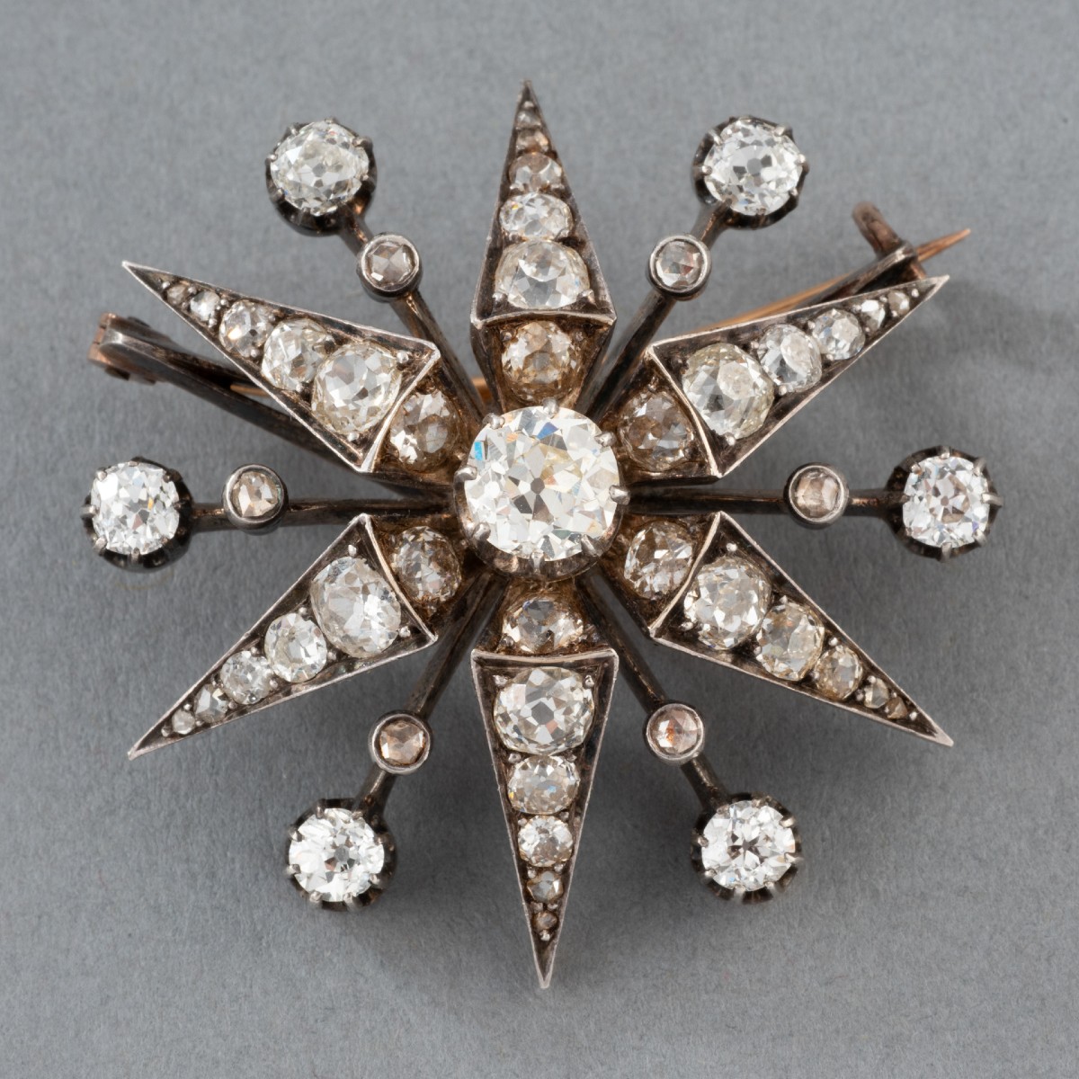 Antique Star Brooch In Gold, Silver And Diamonds