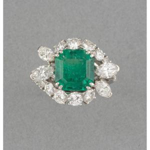 Vintage Mauboussin Ring Set In Diamonds And 4 Carat Emerald