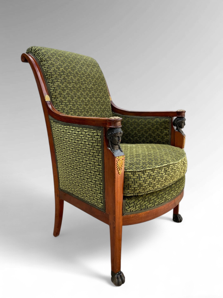 Bergère en acajou à dossier renversé. Epoque Consulat.