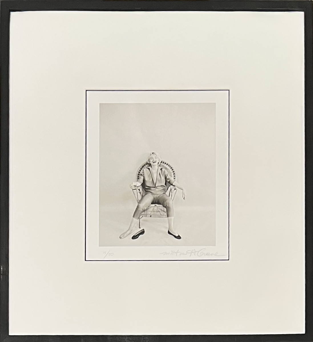 Milton H.Greene - Marilyn Monroe, Wicker chair sitting - Épreuve argentique - 1954