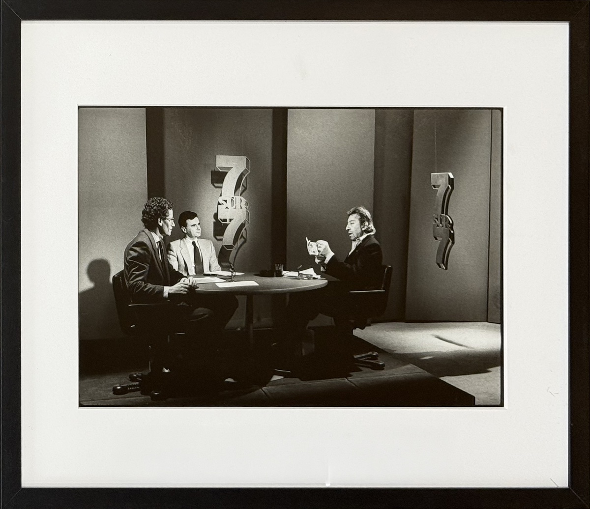 Michel Giniès - Serge Gainsbourg Sets His 500 Francs On Fire - Original Photograph - 1984