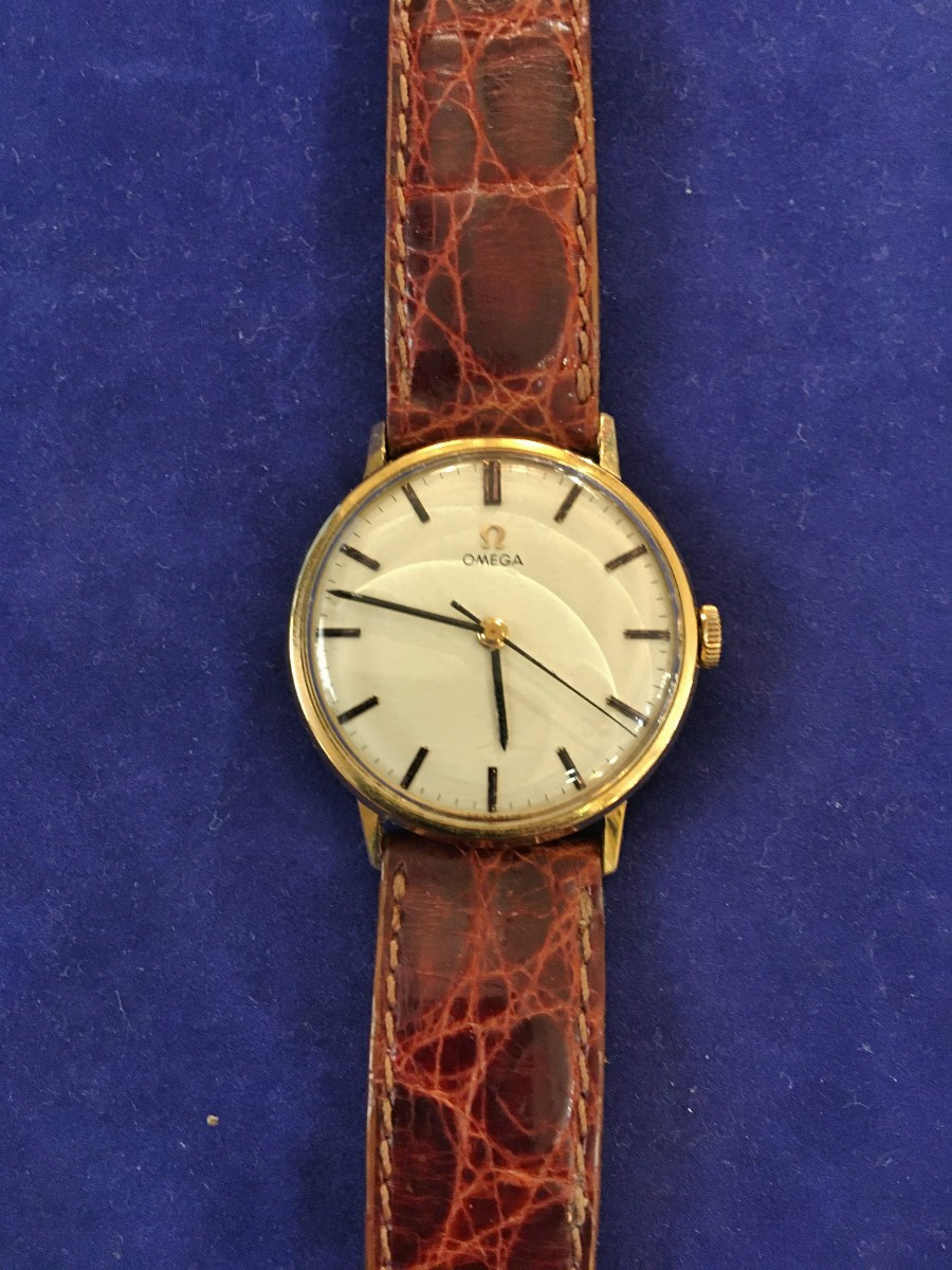 Montre Oméga en or 18K  année 1960