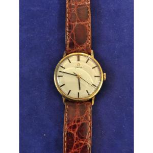 Montre Oméga en or 18K  année 1960