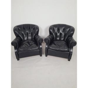 Paire de clubs en cuir