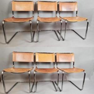 Suite de 6 chaises Thonet en métal tubulaire, assises en cuir jaune.