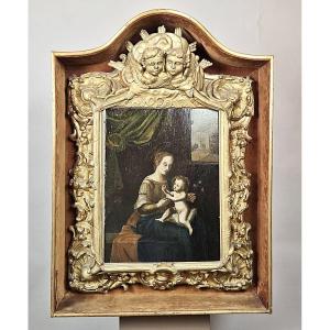 Huile sur panneau représentant une « Vierge à l’Enfant » sous niche, fin du XVIIe siècle