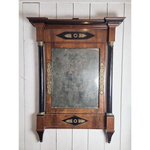 Miroir Empire en acajou, bois poly noir et ornementation de laiton