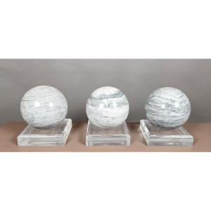 Decorative Marble Sphere Resting On Its Base.