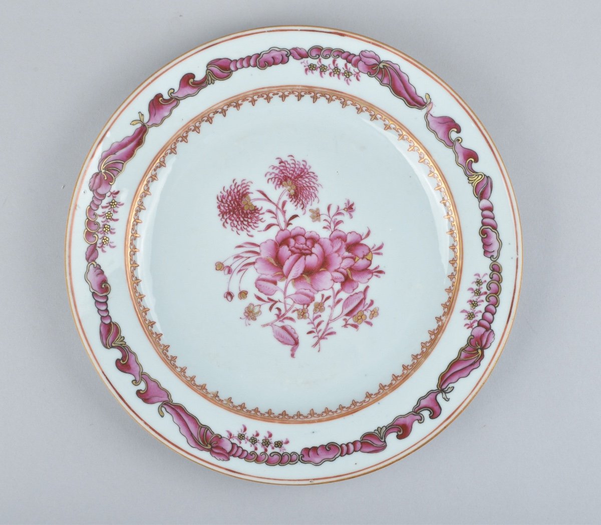 Four Chinese Famille Rose Rocaille And Scrolls Plates. Qianlong